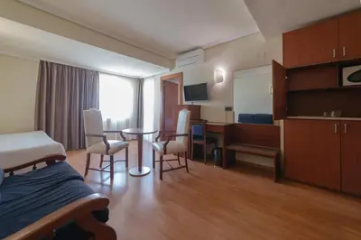 Cama o camas de una habitación en Torreluz Apartamentos