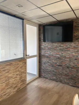 Una televisión o centro de entretenimiento en Ubicación impresionante A 15 metros de la playa Mojacar