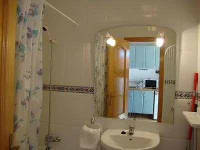 Un baño de Fenix Apartamentos