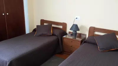 Cama o camas de una habitación en Hospederia Montes