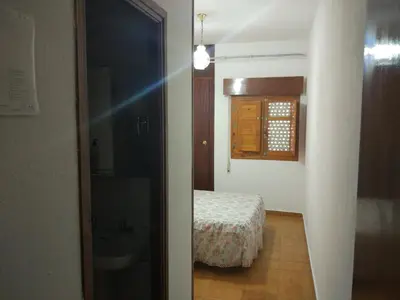 Cama o camas de una habitación en Hospederia Montes