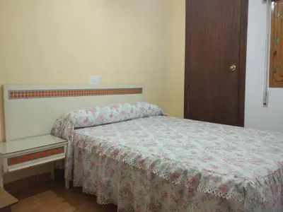 Cama o camas de una habitación en Hospederia Montes