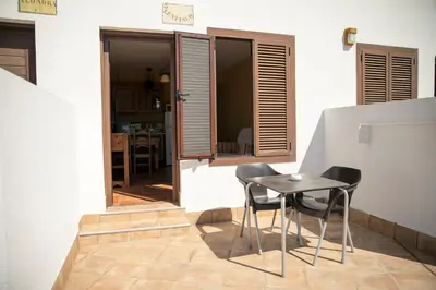 Un patio o zona al aire libre en Hospederia Rural Los Palmitos
