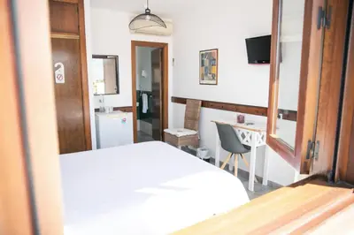 Una televisión o centro de entretenimiento en Hospederia Rural Los Palmitos