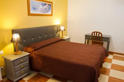 Cama o camas de una habitación en Hostal Rural Alba