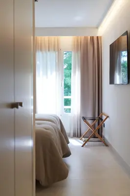 Una televisión o centro de entretenimiento en Hotel-Restaurante Jardines La Tejera
