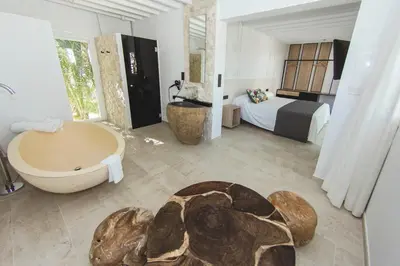 Cama o camas de una habitación en Botaniq Hotel Boutique