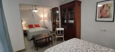 Cama o camas de una habitación en Tríplex Faro
