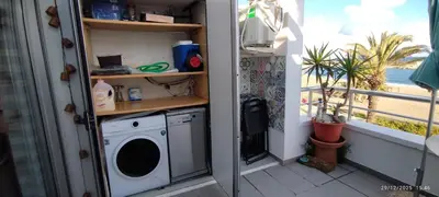 Una cocina o zona de cocina en Tríplex Faro