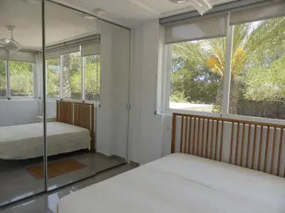 Cama o camas de una habitación en Casa Jardin