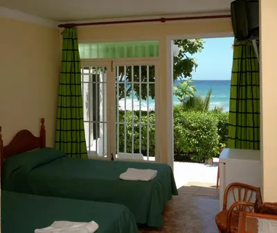 Cama o camas de una habitación en Hotel Playa