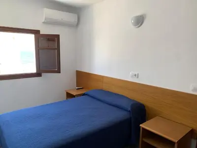 Cama o camas de una habitación en Hotel Playa