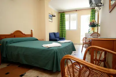 Cama o camas de una habitación en Hotel Playa