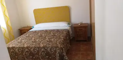 Cama o camas de una habitación en Los Castros