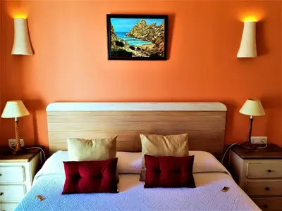 Cama o camas de una habitación en Hotel las Calas