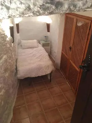 Cama o camas de una habitación en Cueva Chelaja