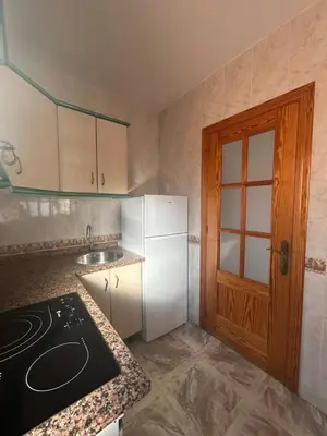 Una cocina o zona de cocina en Viviendas turísticas Salomé