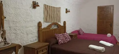 Cama o camas de una habitación en Cueva el Monteron