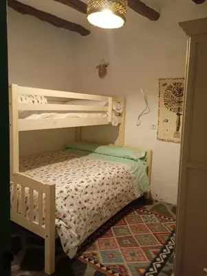 Cama o camas de una habitación en La Maestra