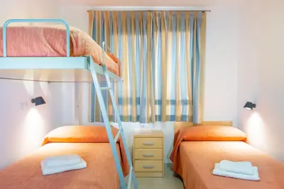 Cama o camas de una habitación en Albergue Inturjoven Almeria