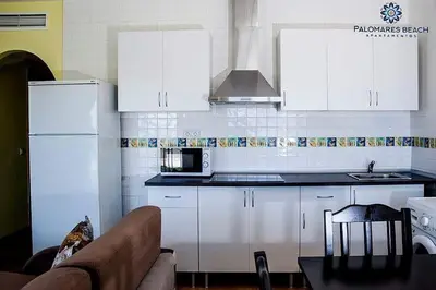 Una cocina o zona de cocina en HOTEL Palomares Beach