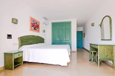 Cama o camas de una habitación en Hostal Manolo