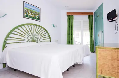 Una televisión o centro de entretenimiento en Hostal Manolo