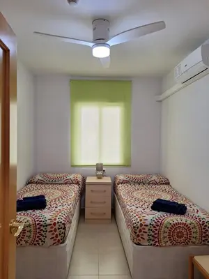 Cama o camas de una habitación en Apartamento Almerimar primera linea de playa