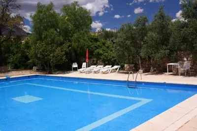 Piscina en o cerca de Cortijo El Álamo