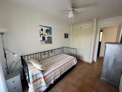 Cama o camas de una habitación en Apartamentos Arcos Calabardina