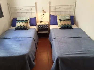 Cama o camas de una habitación en San Jose Apartamentos SL Casa Mar