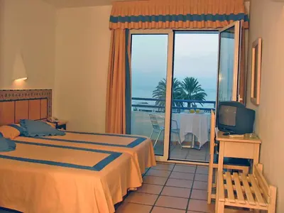 Cama o camas de una habitación en Virgen del Mar Holidays