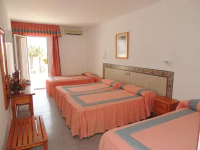 Cama o camas de una habitación en Virgen del Mar Holidays