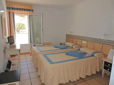Cama o camas de una habitación en Virgen del Mar Holidays