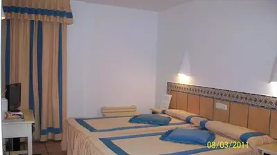 Cama o camas de una habitación en Virgen del Mar Holidays
