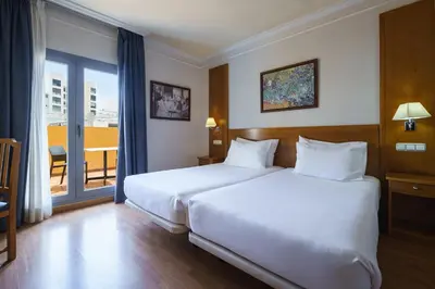 Cama o camas de una habitación en Crisol Almería