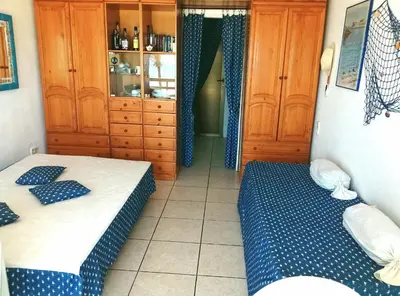 Cama o camas de una habitación en Estudio Frente Al Mar