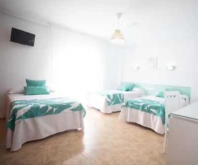 Cama o camas de una habitación en Hotel Blanca Brisa Cabo de Gata