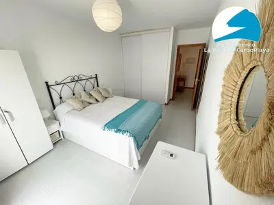 Cama o camas de una habitación en La Puntica Carboplaya