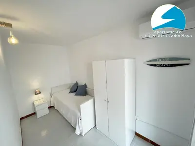 Cama o camas de una habitación en La Puntica Carboplaya