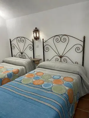 Cama o camas de una habitación en Cueva El Jaraiz