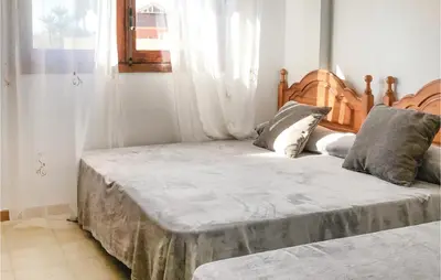 Cama o camas de una habitación en Lovely Apartment In Roquetas De Mar