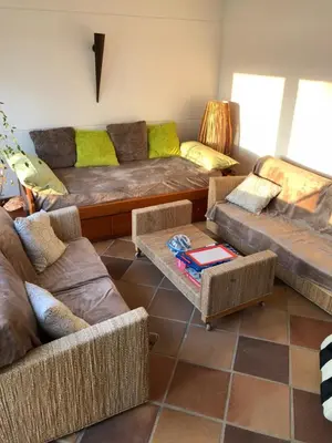 Zona de estar de villa cinco palmas