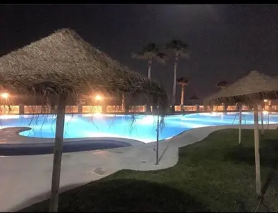 Piscina en o cerca de Primera Linea De Playa
