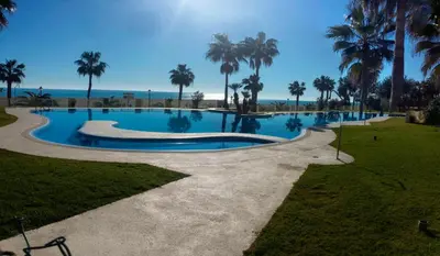 Piscina en o cerca de Primera Linea De Playa