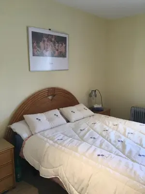 Cama o camas de una habitación en Arabella Naturist Apartment