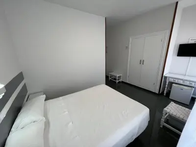 Cama o camas de una habitación en Hostal Venta Del Sol