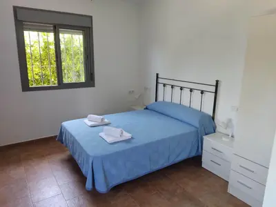 Cama o camas de una habitación en Villas Montemar
