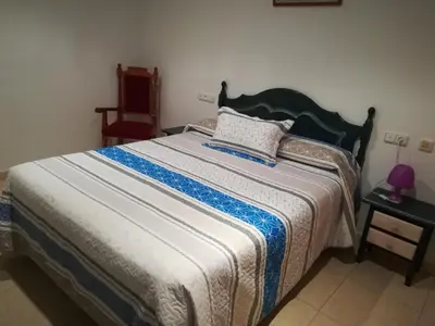 Cama o camas de una habitación en Hostal Sol Bahía San José