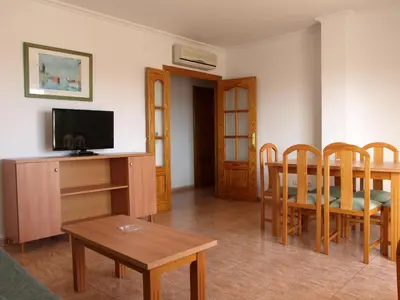 Una televisión o centro de entretenimiento en Apartamentos Maracay